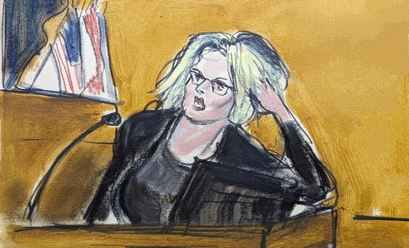 Stormy Daniels testifies in Manhattan criminal court, Tuesday, May 7, 2024, in New York, about the encounter in former President Donald Trump's hotel penthouse, showing how she found Trump in his bedroom lying on his bed. (Elizabeth Williams via AP)