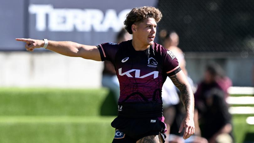 BRISBANE, AUSTRALIA - APRIL 30: Reece Walsh points to the spot as he calls out to his team mates during a Brisbane Broncos NRL training session at Clive Berghofer Field on April 30, 2024 in Brisbane, Australia. (Photo by Bradley Kanaris/Getty Images)