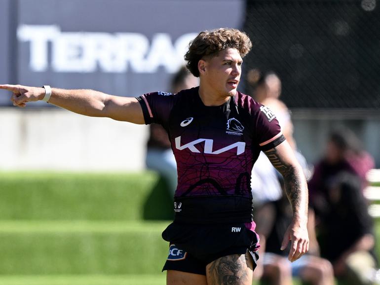 BRISBANE, AUSTRALIA - APRIL 30: Reece Walsh points to the spot as he calls out to his team mates during a Brisbane Broncos NRL training session at Clive Berghofer Field on April 30, 2024 in Brisbane, Australia. (Photo by Bradley Kanaris/Getty Images)