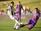 Macarthur FC captain Ulises Davila is tackled by Aaron McEneff of Glory back in 2022. This is not one of the matches allegedly affected by the betting scandal.