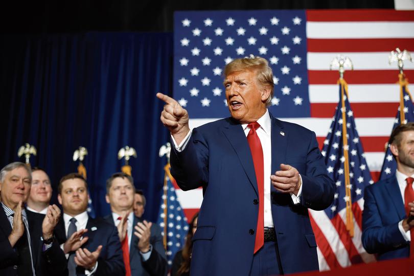 DES MOINES, IOWA - JANUARY 15: Former President Donald Trump speaks at his caucus night event at the Iowa Events Center on January 15, 2024 in Des Moines, Iowa. Iowans voted today in the state's caucuses for the first contest in the 2024 Republican presidential nominating process. Trump has been projected winner of the Iowa caucus. (Photo by Chip Somodevilla/Getty Images)