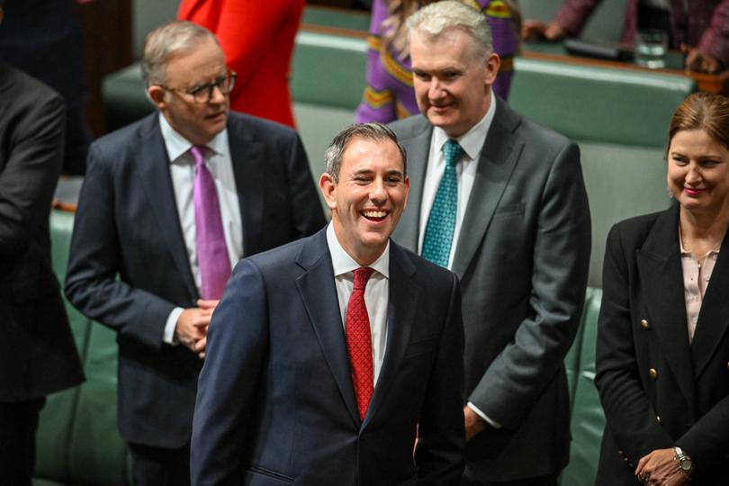 CANBERRA, AUSTRALIA - MAY 14: Australia’s Treasurer Jim Chalmers smiles before delivering his budget speech at Parliament House on May 14, 2024 in Canberra, Australia. Australia's Labor government is grappling with a slowing economy, weaker commodity prices, soaring housing costs and a softening labor market as it prepares to unveil its federal budget on May 14. To counter these headwinds, the budget is expected to feature smaller revenue upgrades compared to recent years, while outlining the government's interventionist policies aimed at boosting domestic manufacturing and the transition to green energy. Critics warn that such industrial policies risk fueling inflation and diverting resources from more productive sectors of the economy. The budget is seen as a key opportunity for the Labor government to deliver broad economic support that analysts say is fundamental to re-election chances next year. (Photo by Tracey Nearmy/Getty Images)