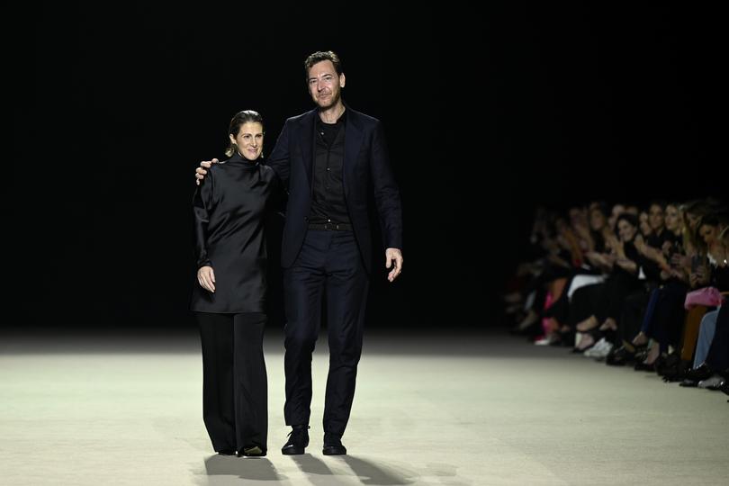 SYDNEY, AUSTRALIA - MAY 13:Creative Director of Carla Zampatti Karlie Ungar and CEO of Carla Zampatti Alex Schuman thank the audience after the Carla Zampatti Presented by Porsche show during Australian Fashion Week Presented By Pandora 2024 at Carriageworks on May 13, 2024 in Sydney, Australia. (Photo by Stefan Gosatti/Getty Images for AFW)