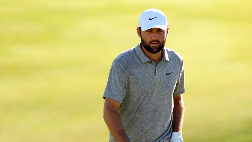 Scottie Scheffler of the United States walks on the 18th green during the third round of the 2024 PGA Championship at Valhalla Golf Club. 