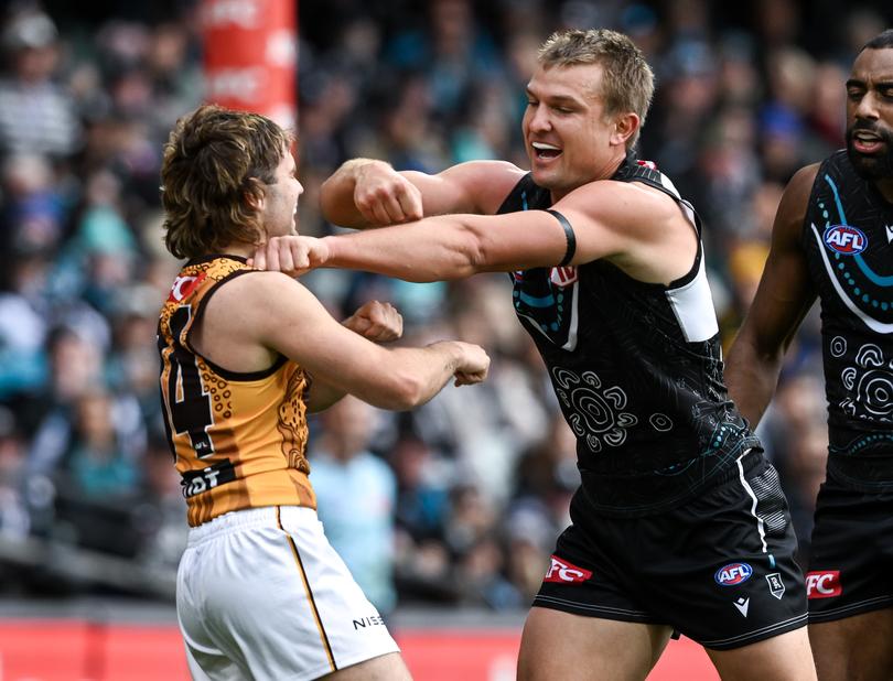 ADELAIDE, AUSTRALIA - MAY 19: Ollie Wines of the Power fights with Nick Watson of the Hawks during the round 10 AFL match between Yartapuulti (the Port Adelaide Power) and Hawthorn Hawks at Adelaide Oval, on May 19, 2024, in Adelaide, Australia. (Photo by Mark Brake/Getty Images via AFL Photos)