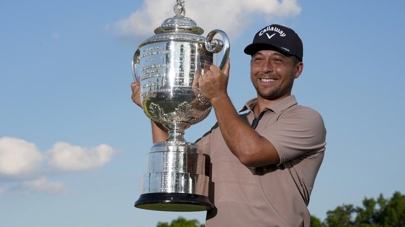 Xander Schauffele holds the Wanamaker Trophy after winning the PGA Championship. (AP PHOTO)