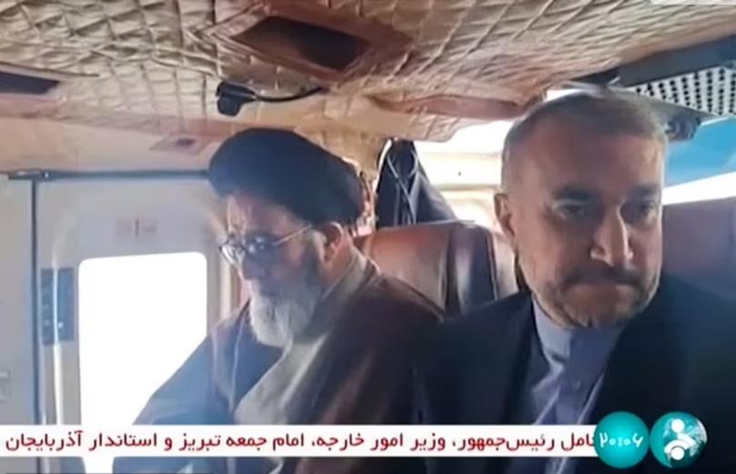 Iranian president Ebrahim Raisi (left) was pictured moments before the helicopter crash near the border with Azerbaijan.
