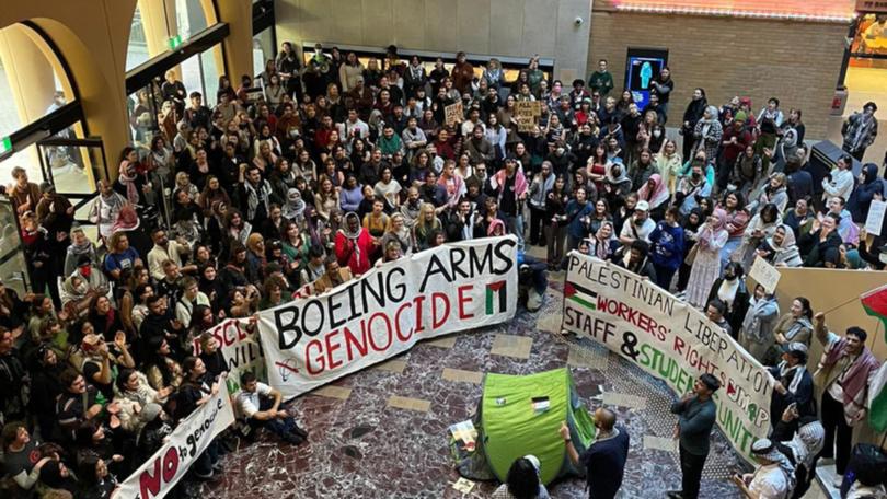 More than 100 students took over the Arts West building at the University of Melbourne in a dramatic sit-in on Wednesday afternoon (May 15).