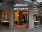 Investors punished jewellery group Michael Hill on Monday following a profit downgrade. 