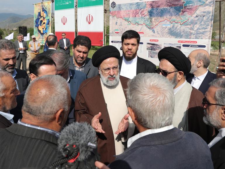 Iranian President Ebrahim Raisi visiting the site of a proposed road and rail bridge project over the Aras River, following a meeting with Azerbaijani President Ilham Aliyev. His helicopter crashed shortly afterwards, killing Mr Raisi and his foreign minister.