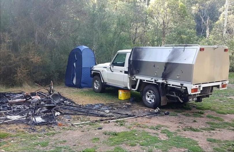 Mr Hill's white Toyota Landcruiser was found with minor fire damage at their burnt campsite near Dry River Creek Track in the valley on March 21