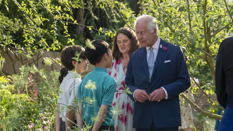 King Charles was given a badge by schoolchildren, naming hi ‘King of Compost’.