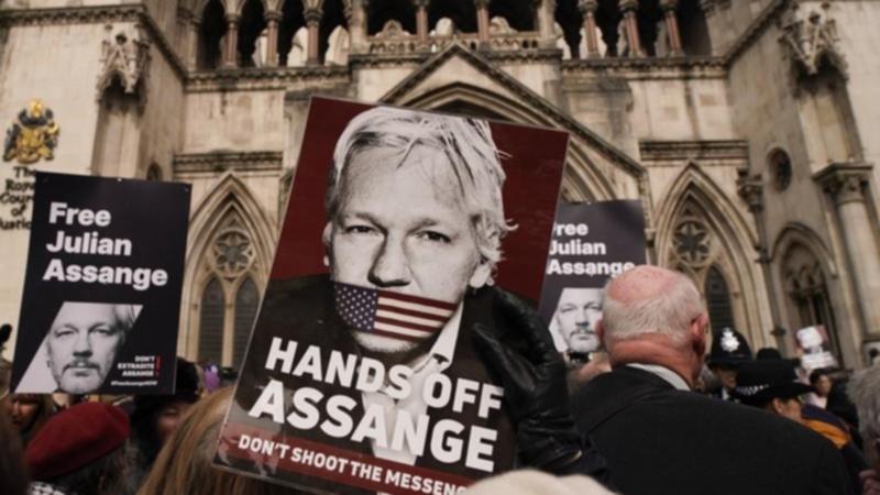 Julian Assange is fighting extradition in the UK High Court to avoid espionage charges in the US. (AP PHOTO)