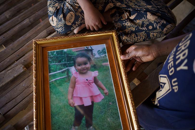 A photo of Yurin Chhin, 2, who died in October of H5N1, one of many viruses that cause influenza in birds, in the village of Trapeang Skom in Cambodia.