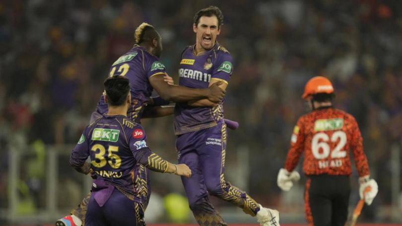 Mitchell Starc celebrates the dismissal of Travis Head (62) for a second-ball duck in the IPL