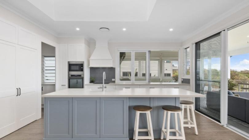 37 Surfside Drive in Catherine Hill Bay is listed with a guide of $4.8 million to $5.1 million with Nick Clarke and Taylah Clarke at Clarke and Co Estate Agents. The kitchen was built by Nadin West Joinery.