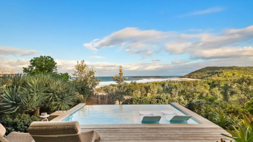 37 Surfside Drive in Catherine Hill Bay is listed with a guide of $4.8 million to $5.1 million with Nick Clarke and Taylah Clarke at Clarke and Co Estate Agents. The alfresco area.