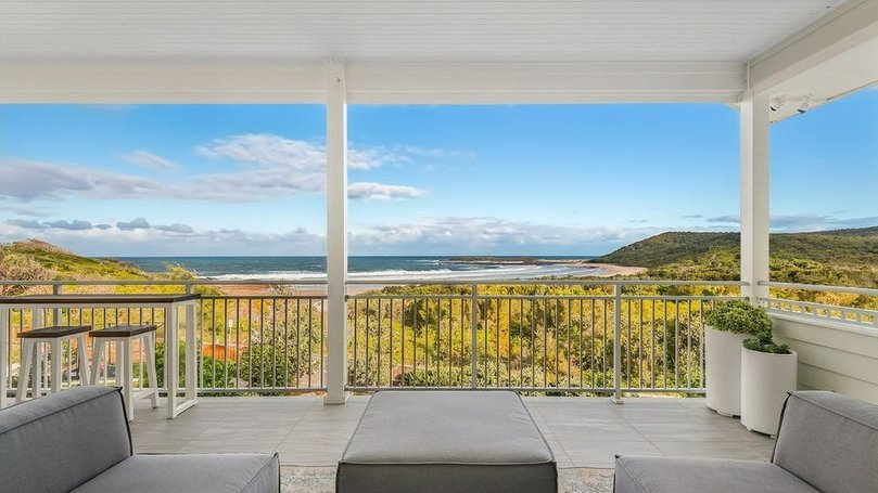 37 Surfside Drive in Catherine Hill Bay is listed with a guide of $4.8 million to $5.1 million with Nick Clarke and Taylah Clarke at Clarke and Co Estate Agents. The property has uninterrupted views of Moonee Beach.