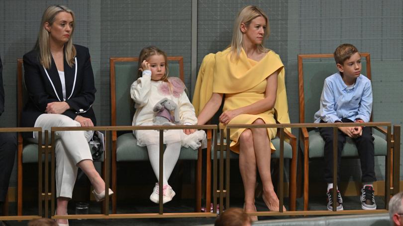 Jodie Haydon, Laura Chalmers and kids Leo and Annabel as Treasurer Jim Chalmers hands down the 2024-25 Budget in the House of Representatives at Parliament House in Canberra, Tuesday, May 14, 2024. (AAP Image/Mick Tsikas) NO ARCHIVING