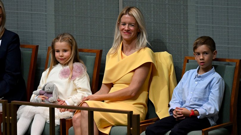 JENI O’DOWD: A woman wore a nice dress to support her husband in his big moment. Real scintillating stuff.