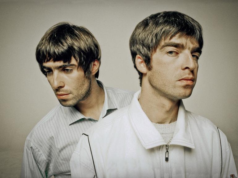 Oasis - Liam Gallagher and Noel Gallagher. 