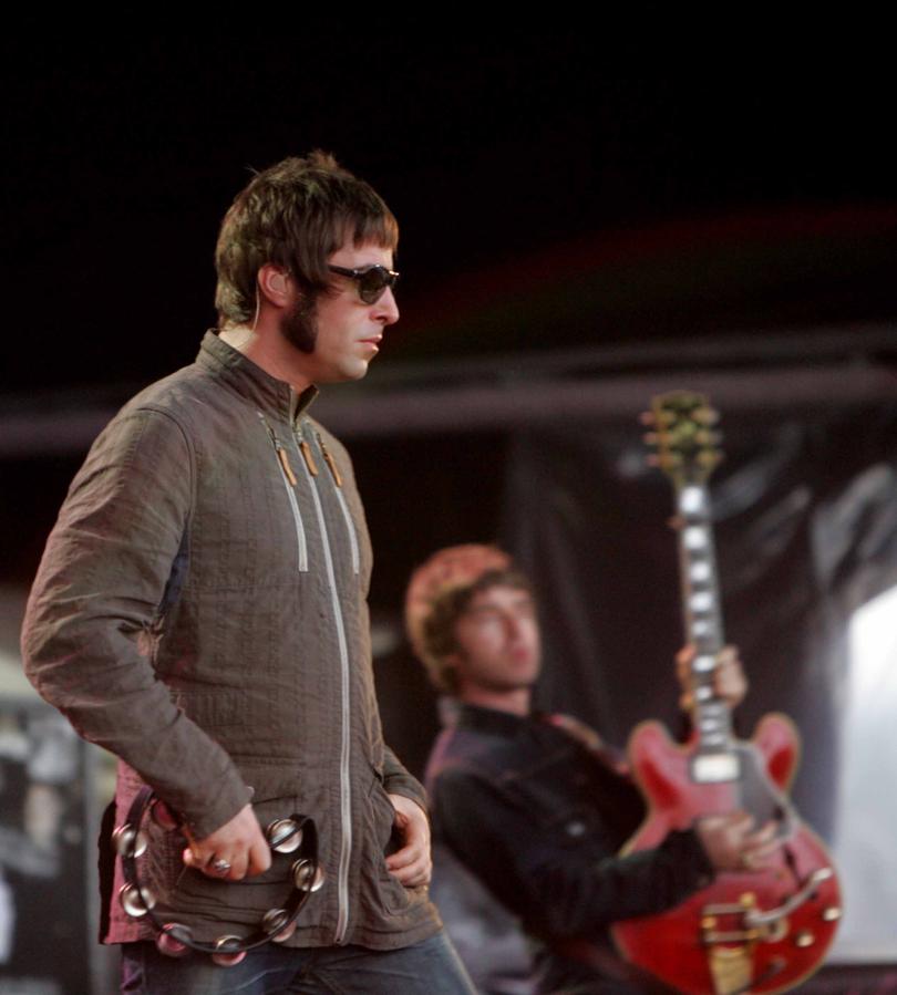 Oasis brothers (l-r) Liam Gallagher & Noel Gallagher on stage at Rock-It.