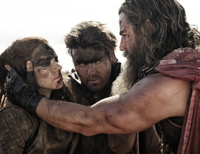 Anya-Taylor Joy, Tom Burke and Chris Hemsworth in Furiosa.