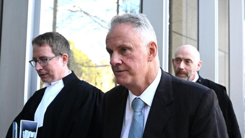 Mark Latham heads to court.