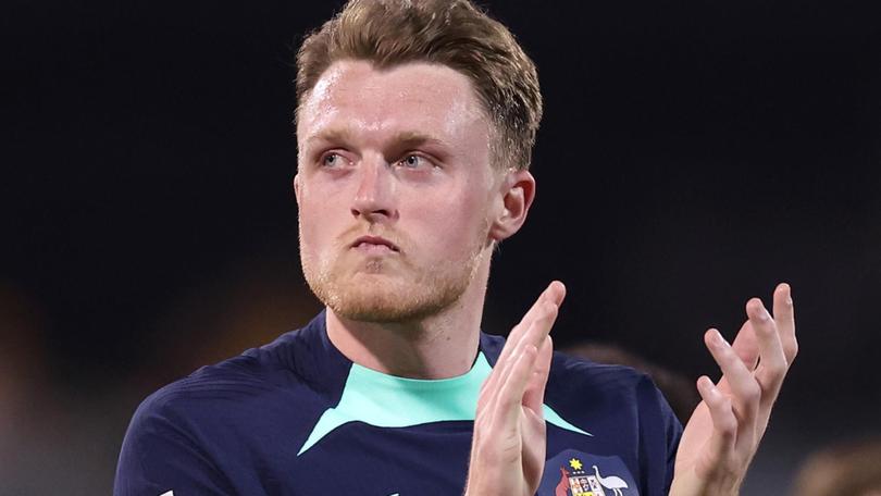 Socceroos coach Graham Arnold wants Harry Souttar (top) to secure a move to a new club.