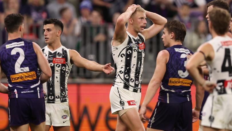 Billy Frampton of the Magpies reacts a free kick is awarded to Sean Darcy.