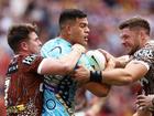 The Broncos struggled to contain barnstorming Titans forward David Fifita (centre).