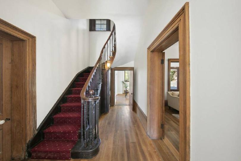 The grand staircase in the hallway.