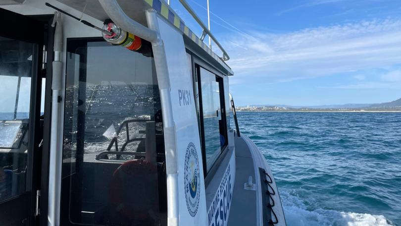 A search team made the grim find soon after a search was launched for the men who had been swept into the sea. 
