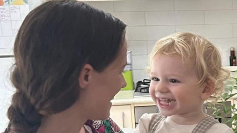 Sophie Roome holding her son Rowan.