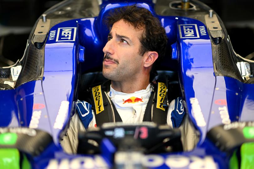 MIAMI, FLORIDA - MAY 02: Daniel Ricciardo of Australia and Visa Cash App RB has a seat fitting in the garage during previews ahead of the F1 Grand Prix of Miami at Miami International Autodrome on May 02, 2024 in Miami, Florida. (Photo by Rudy Carezzevoli/Getty Images)