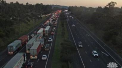 A six car crash has traffic banked up almost 10kms.