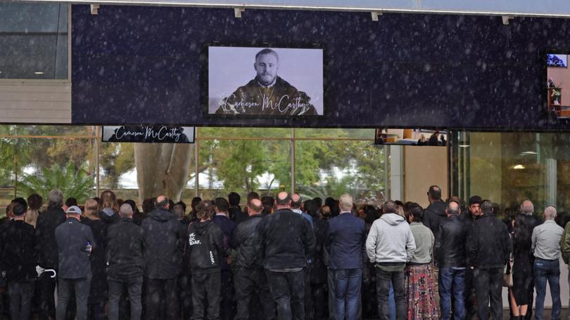 Former Fremantle Docker Cameron McCarthy was remembered at a moving funeral service.