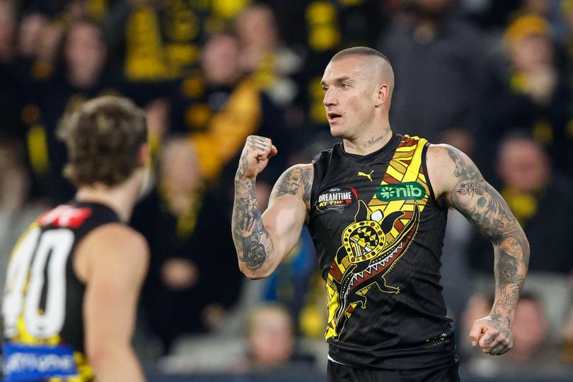 MELBOURNE, AUSTRALIA - MAY 25: Dustin Martin of the Tigers celebrates a goal during the 2024 AFL Round 11 match between the Richmond Tigers and the Essendon Bombers at The Melbourne Cricket Ground on May 25, 2024 in Melbourne, Australia. (Photo by Dylan Burns/AFL Photos via Getty Images)