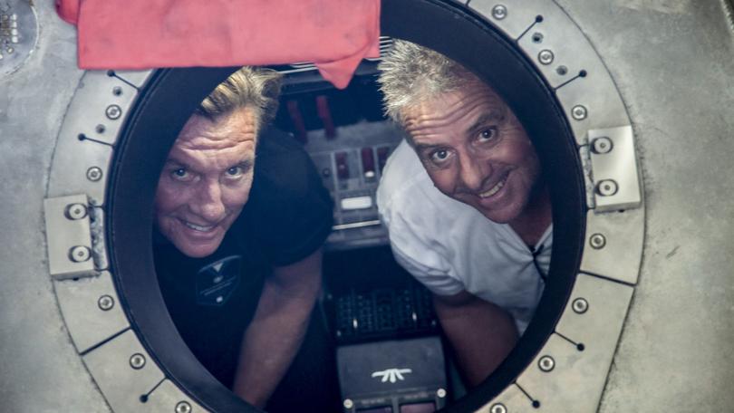 Larry Connor, left, with Patrick Lahey during a 2021 trip to Mariana Trench in the Western Pacific Ocean, where they went on a series of deep dives. Larry Connor, 74, who made his wealth in real estate, said he’s building a new acrylic-hulled submersible that will be certified and rigorously tested to show that deep sea exploration is safe. 