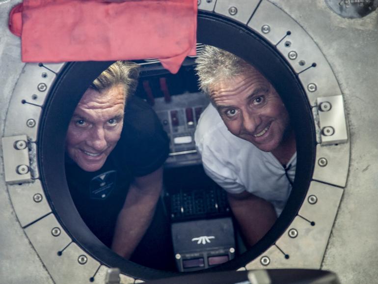 Larry Connor, left, with Patrick Lahey during a 2021 trip to Mariana Trench in the Western Pacific Ocean, where they went on a series of deep dives. Larry Connor, 74, who made his wealth in real estate, said he’s building a new acrylic-hulled submersible that will be certified and rigorously tested to show that deep sea exploration is safe. 