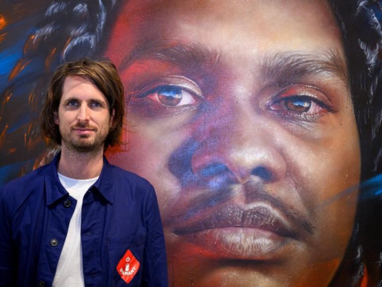 Matt Adnate's portrait of Yolngu rapper Danzal Baker has won the Archibald Packing Room Prize. (Bianca De Marchi/AAP PHOTOS)