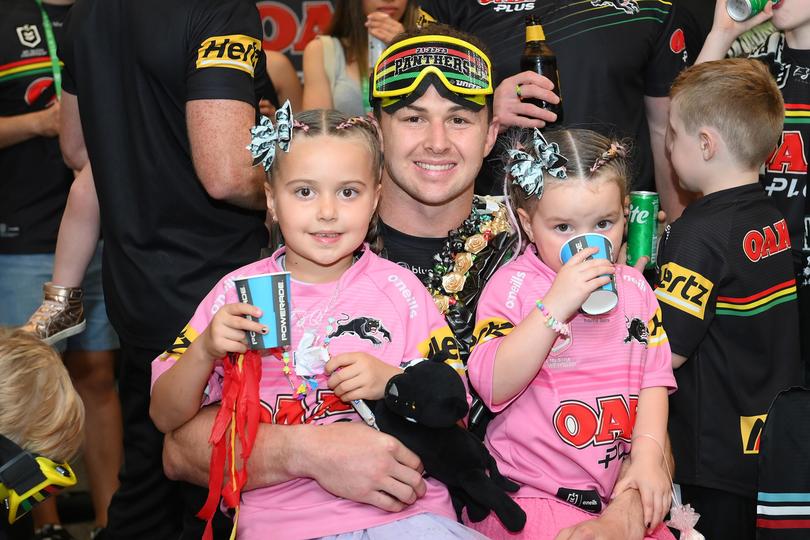 Dylan Edwards celebrates with daughters Bronte and Winter after the 2023 NRL Grand Final.