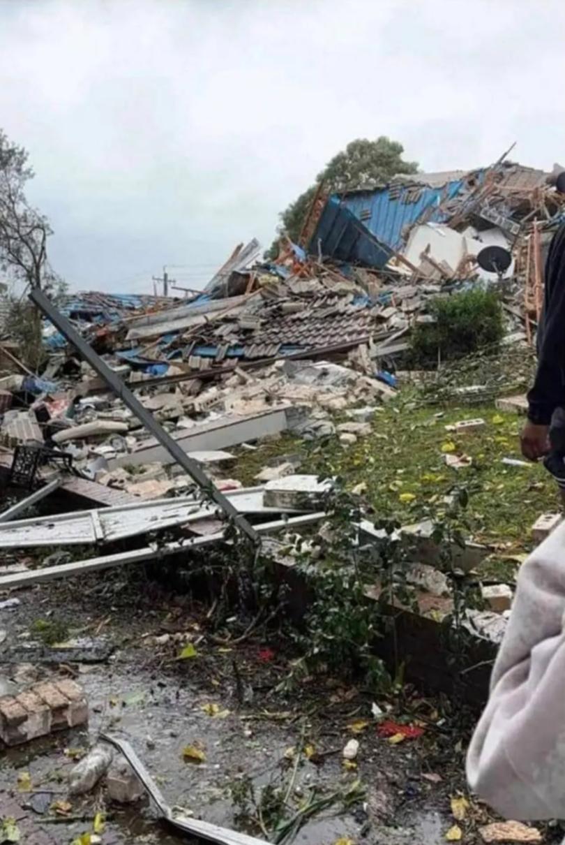 An ‘explosion’ in Sydney’s west has destroyed a unit block and there are fears people are still trapped inside the building.