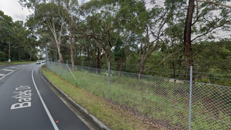 A man has died after crashing into a fence and tree.