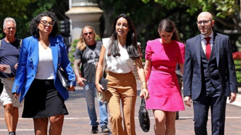 Antoinette Lattouf (centre) was dismissed after sharing a Human Rights Watch post on Instagram. (Toby Zerna/AAP PHOTOS)