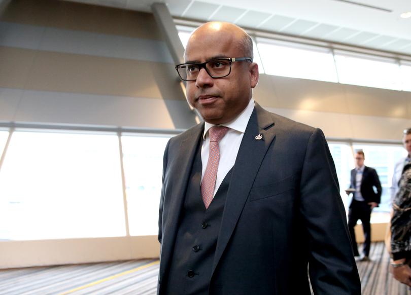 British Industrialist Sanjeev Gupta is seen before addressing the Energy Storage Conference at the Adelaide Convention Centre in Adelaide, Wednesday, May 23, 2018. Producing cheaper, lighter electric cars means Australia can again be a competitive vehicle manufacturer, a leading British industrialist says. Sanjeev Gupta, whose company, GFG Alliance, recently bought Whyalla's steelworks, has committed to producing small-scale electric cars in the country. (AAP Image/Kelly Barnes) NO ARCHIVING