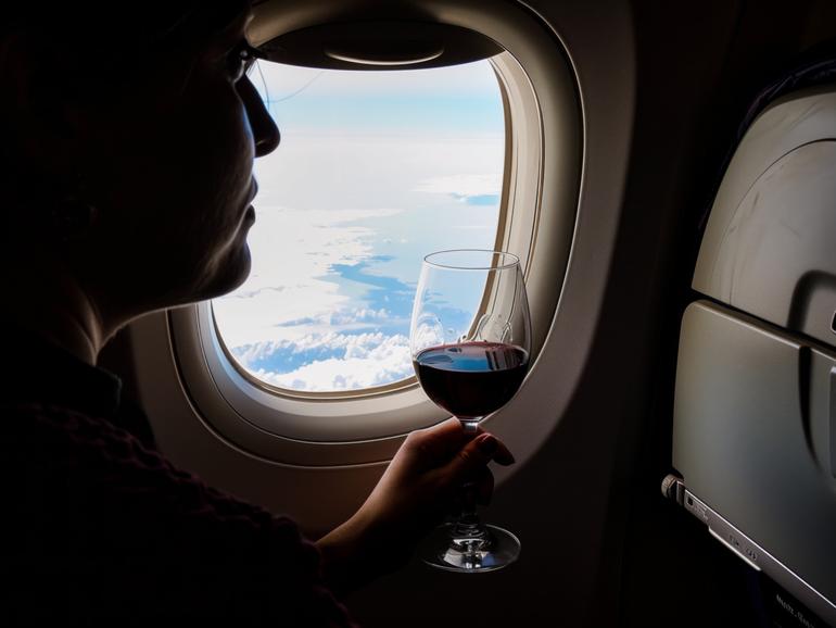 Drinking on a flight could be bad for your health.