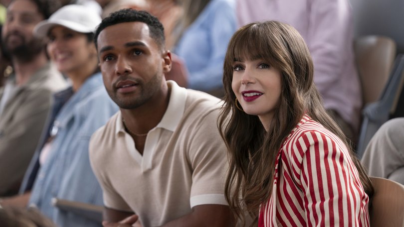 Emily in Paris. (L to R) Lucien Laviscount as Alfie, Lily Collins as Emily in Emily in Paris. Cr. Stephanie Branchu/Netflix  2024