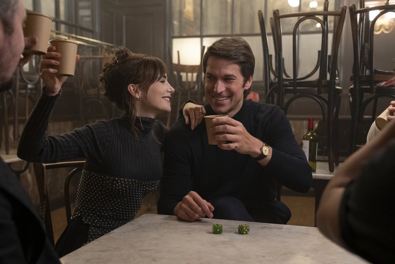 Emily in Paris. (L to R) Lily Collins as Emily, Lucas Bravo as Gabriel in Emily in Paris. Cr. Stephanie Branchu/Netflix  2024