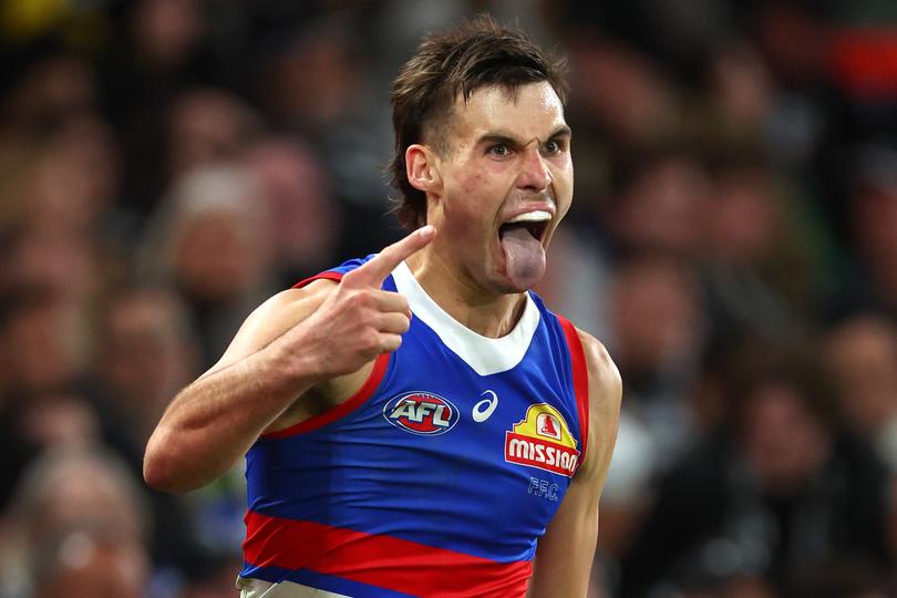 MELBOURNE, AUSTRALIA - MAY 31: Sam Darcy of the Bulldogs celebrates kicking a goal during the round 12 AFL match between Collingwood Magpies and Western Bulldogs at Marvel Stadium, on May 31, 2024, in Melbourne, Australia. (Photo by Quinn Rooney/Getty Images)